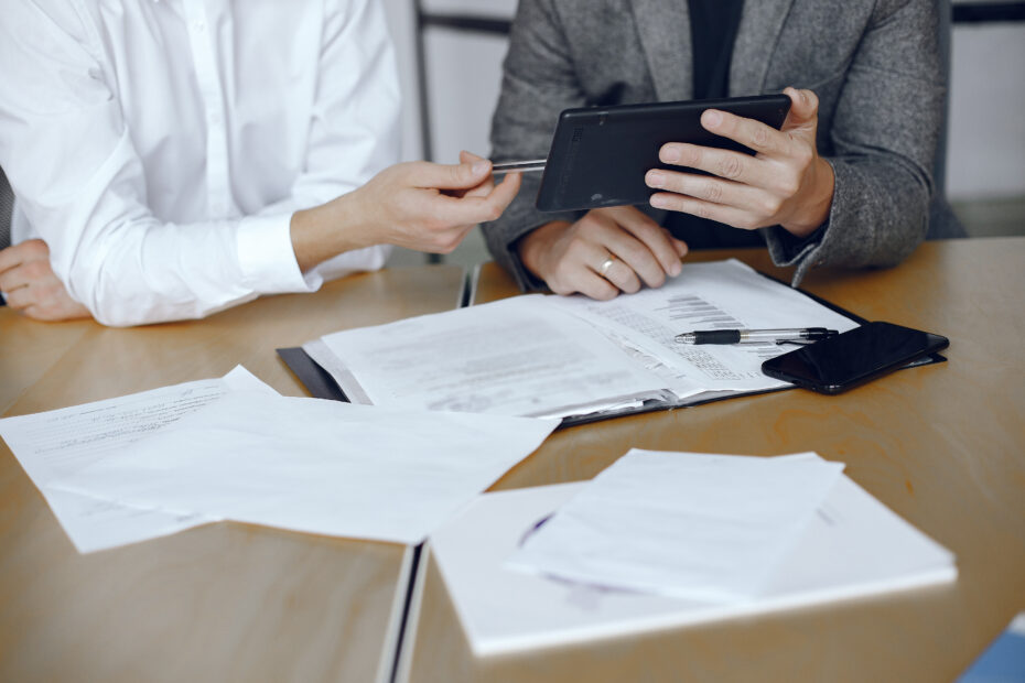 business men sitting lawyers s desk people signing important documents
